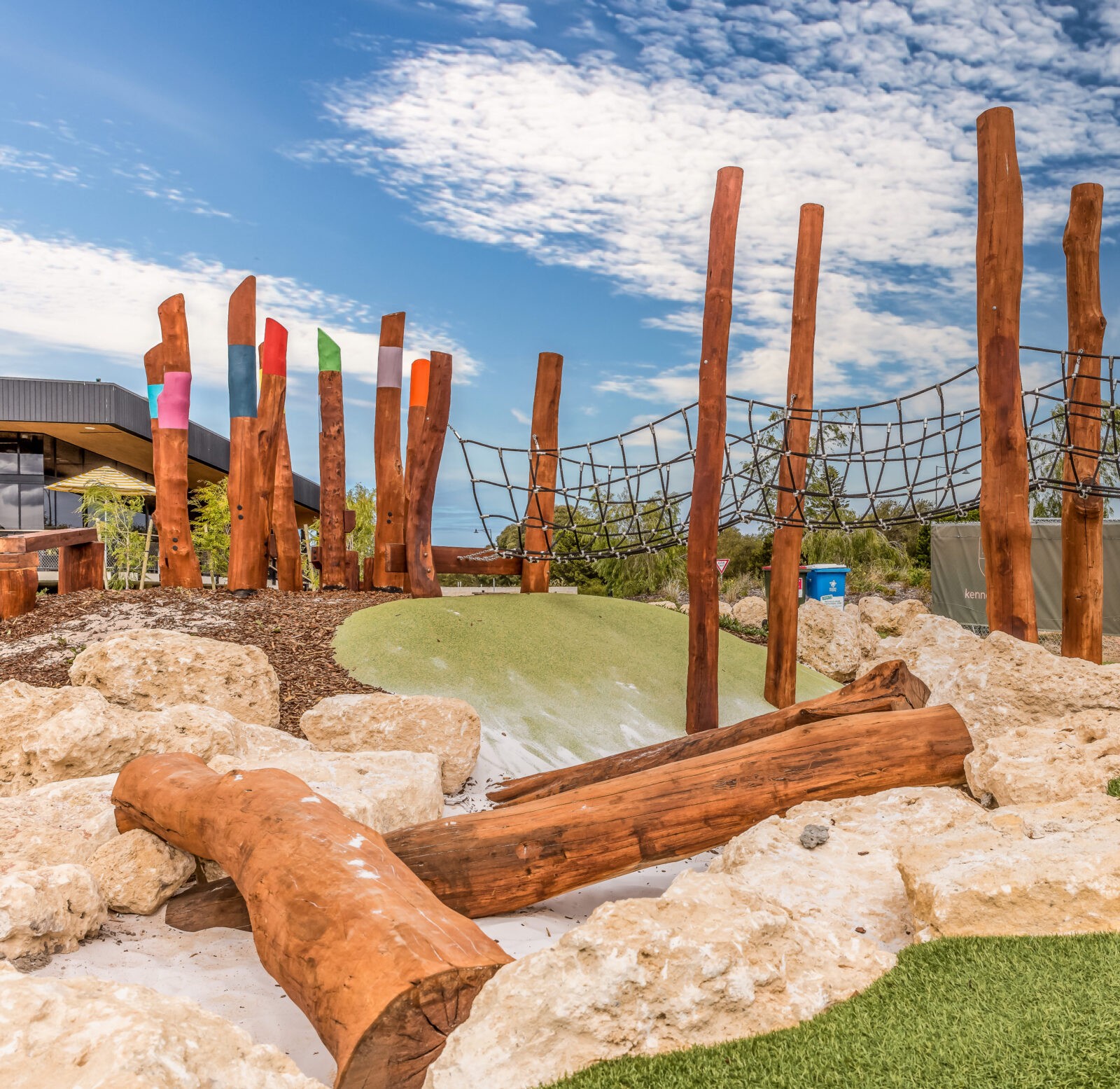 Log | Create engaging play pathways and natural landscape features with our Jarrah logs, perfect for climbing, balancing, and defining playful spaces in outdoor environments | VRI