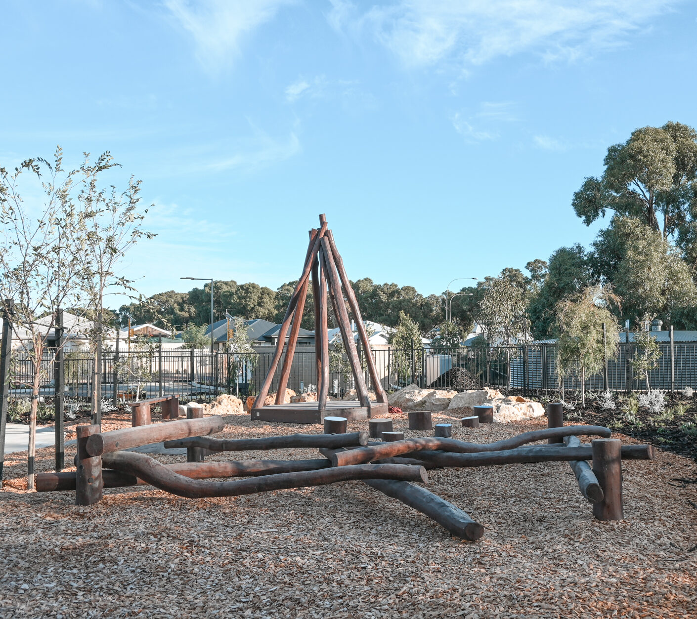 Log Scramble | Challenge young adventurers with our Log Scramble, featuring creatively stacked timber logs that create an engaging obstacle course for climbing, balancing, crawling, and jumping. | VRI