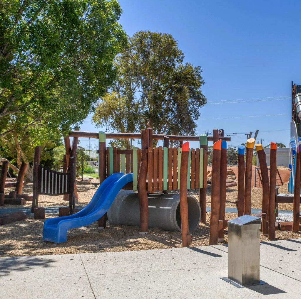 Beldon Platform | Discover the Beldon Platform structure, featuring an cool concrete tunnel retreat, elevated play deck, and climbing challenges crafted from West Australian Jarrah. | VRI