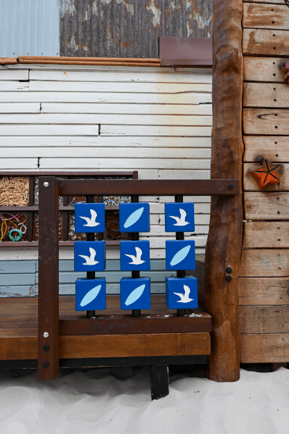 Naughts and Crosses | Engage young minds with our interactive Naughts and Crosses panel, featuring rotating timber blocks and premium Jarrah construction for classic playground gaming experiences. | VRI