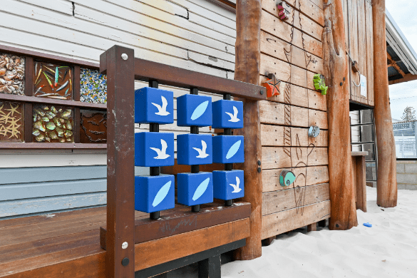 Naughts and Crosses | Engage young minds with our interactive Naughts and Crosses panel, featuring rotating timber blocks and premium Jarrah construction for classic playground gaming experiences. | VRI