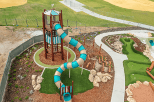 Stand tall with our lighthouse-inspired Kennedy Tower, featuring multiple play levels, giant tube slide, rope climbing challenges and imaginative viewing platforms reaching 7.7 metres into the sky.