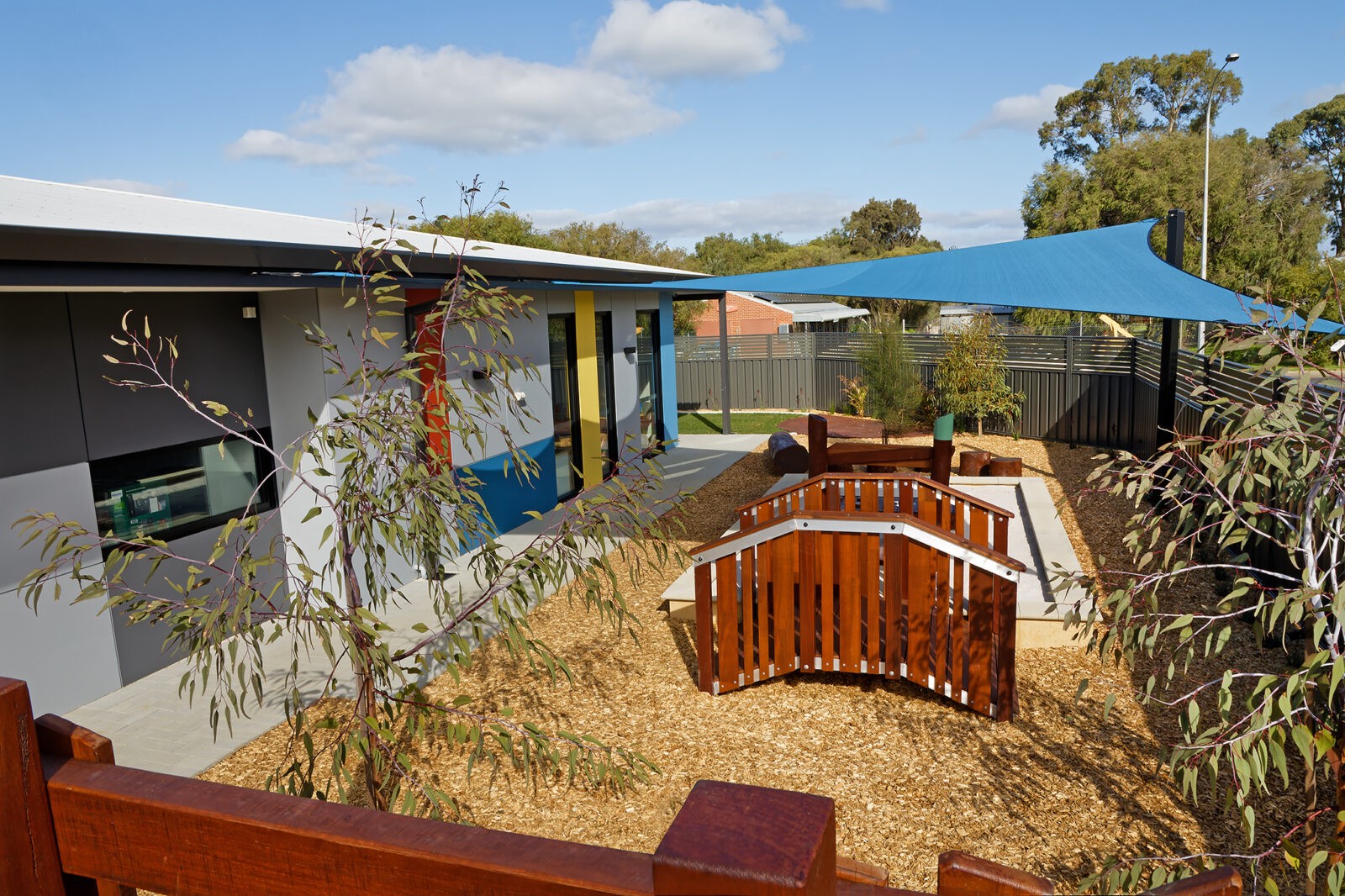 Bridge Type A | Create pathway connections with our Bridge Type A, featuring gentle arch style design, Jarrah hardwood and robust aluminium framework for accessible playground transitions. | VRI