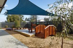 Bridge Type A | Create pathway connections with our Bridge Type A, featuring gentle arch style design, Jarrah hardwood and robust aluminium framework for accessible playground transitions. | VRI