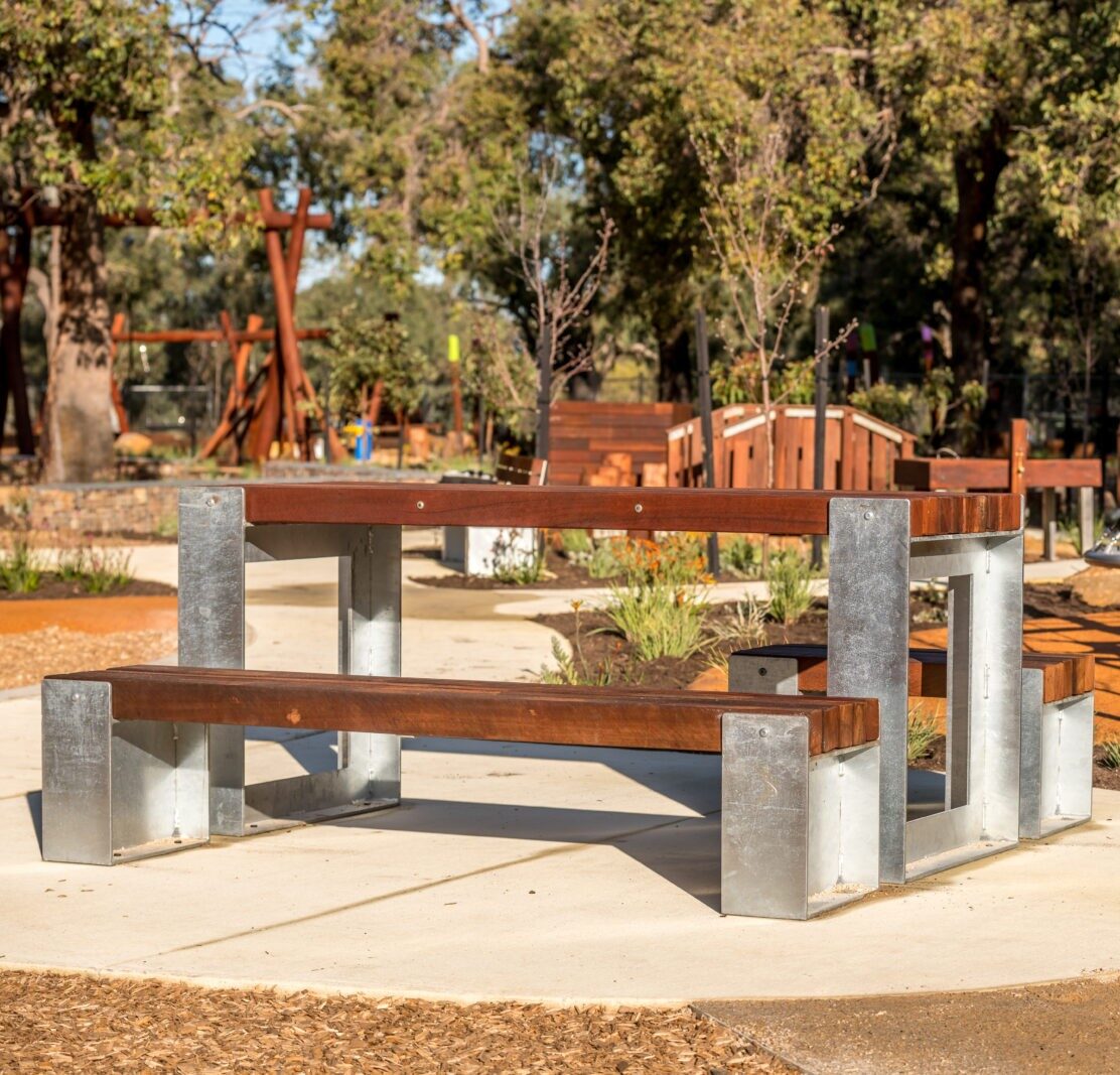 Picnic Table Type B | Create inviting gathering spaces with this classic picnic table, featuring integrated benches, durable West Australian Jarrah battens, and a robust steel frame for parks and schools. | VRI