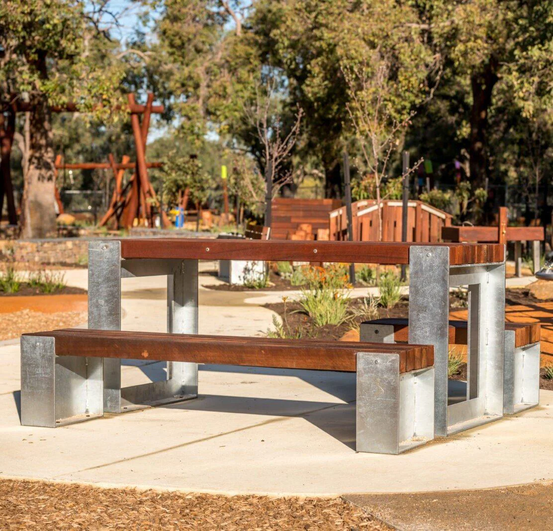 Picnic Table Type B | Create inviting gathering spaces with this classic picnic table, featuring integrated benches, durable West Australian Jarrah battens, and a robust steel frame for parks and schools. | VRI