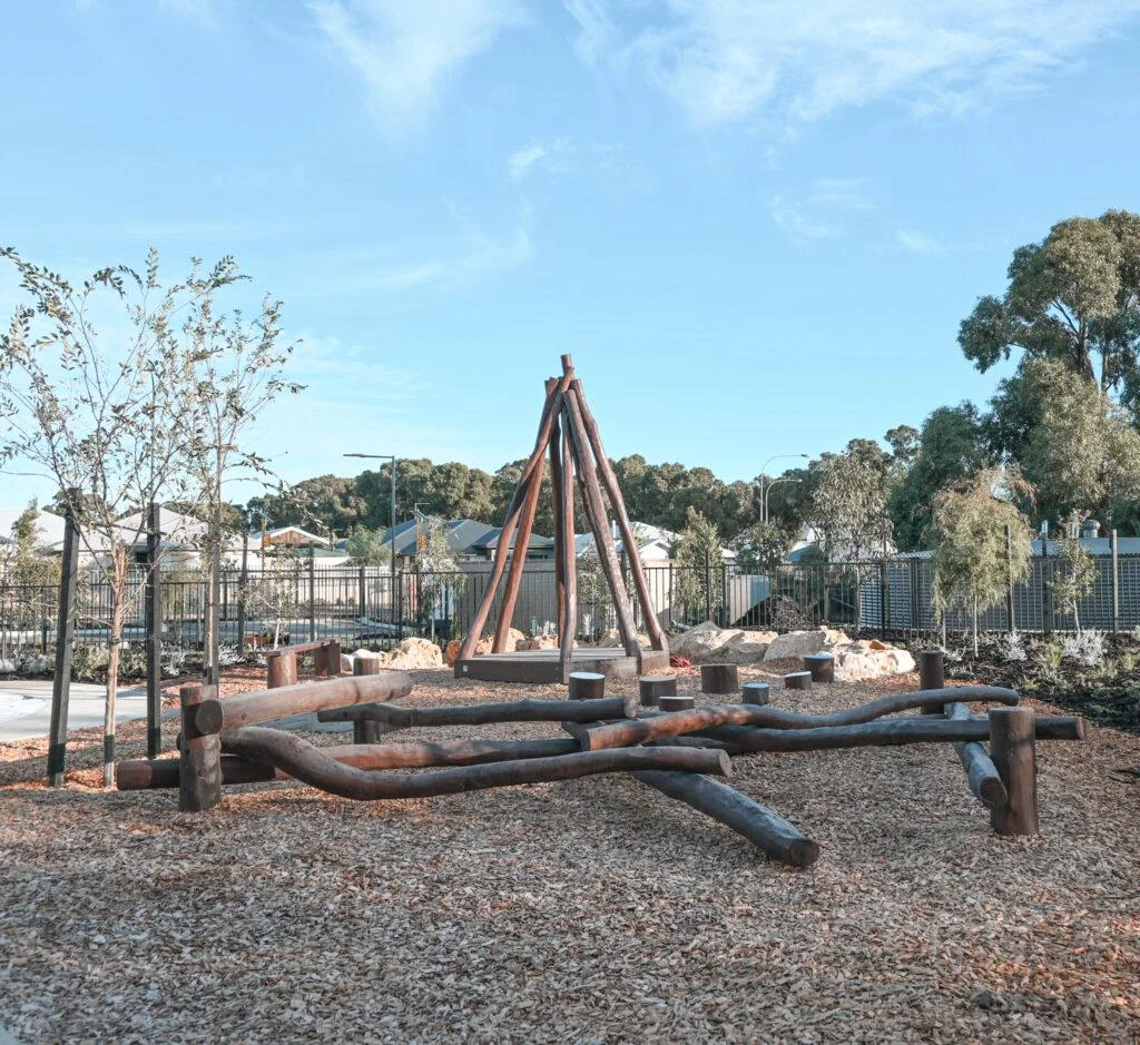 Tee Pee with Accessible Deck | Create versatile play and gathering spaces with our Tee Pee with Accessible Deck semi-sheltered with natural timber poles to provide an elevated space that children can call their own while staying safely in view | VRI