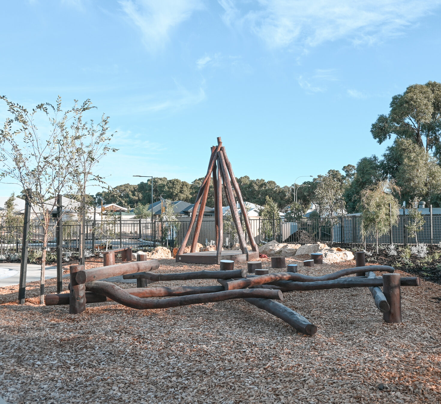 Tee Pee with Accessible Deck | Create versatile play and gathering spaces with our Tee Pee with Accessible Deck semi-sheltered with natural timber poles to provide an elevated space that children can call their own while staying safely in view | VRI
