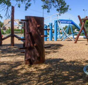 Climbing Stump | Challenge young adventurers with our large natural timber Climbing Stump, featuring integrated timber climbing holds that provide an engaging vertical challenge while developing strength and confidence. | VRI