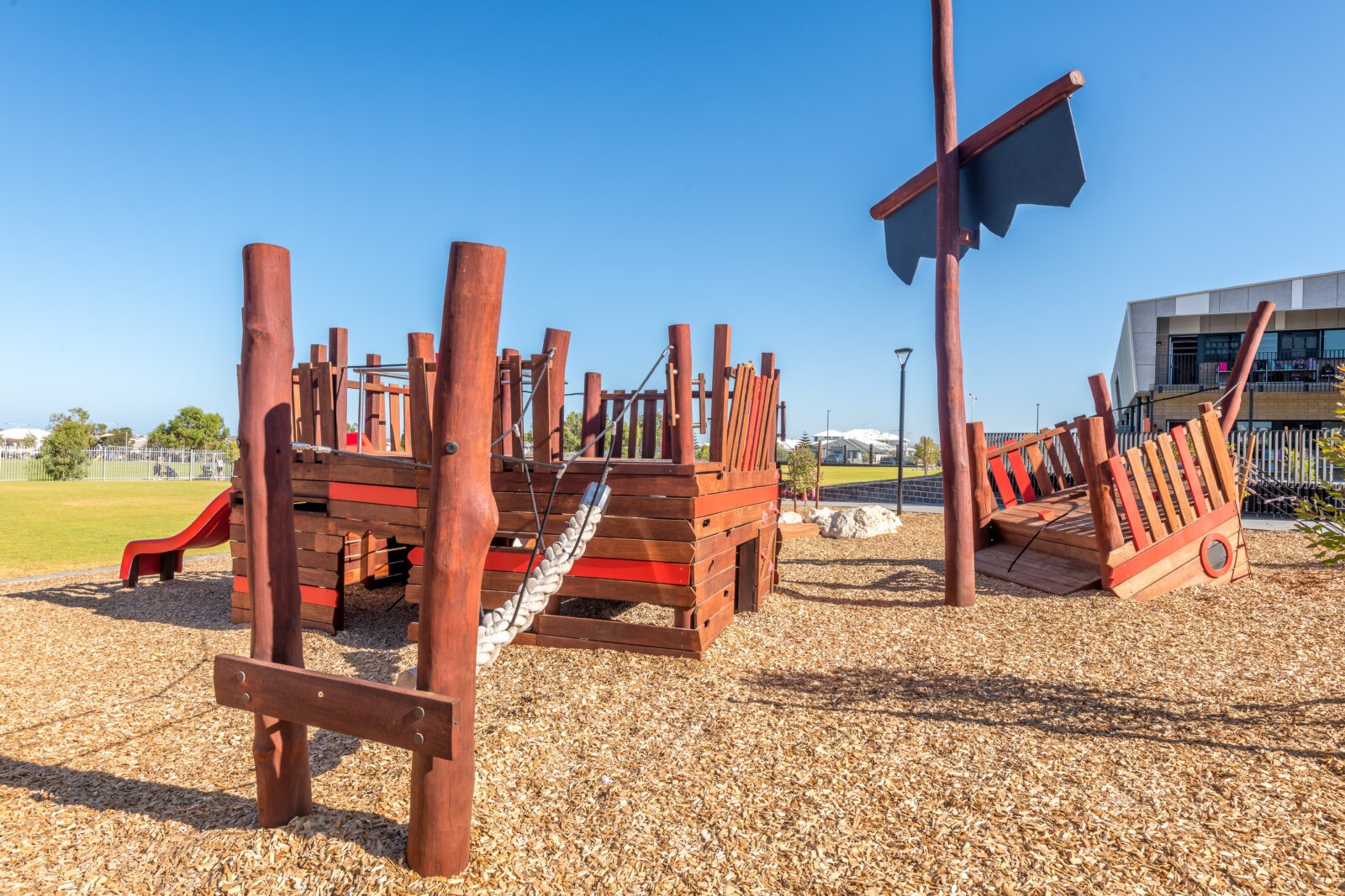 Sunken Ship | Create epic nautical adventures with the Sunken Ship Playground, featuring distinct stern/bow sections, slide, climbing walls, nets, V-rope walk, and hidden play areas. | VRI
