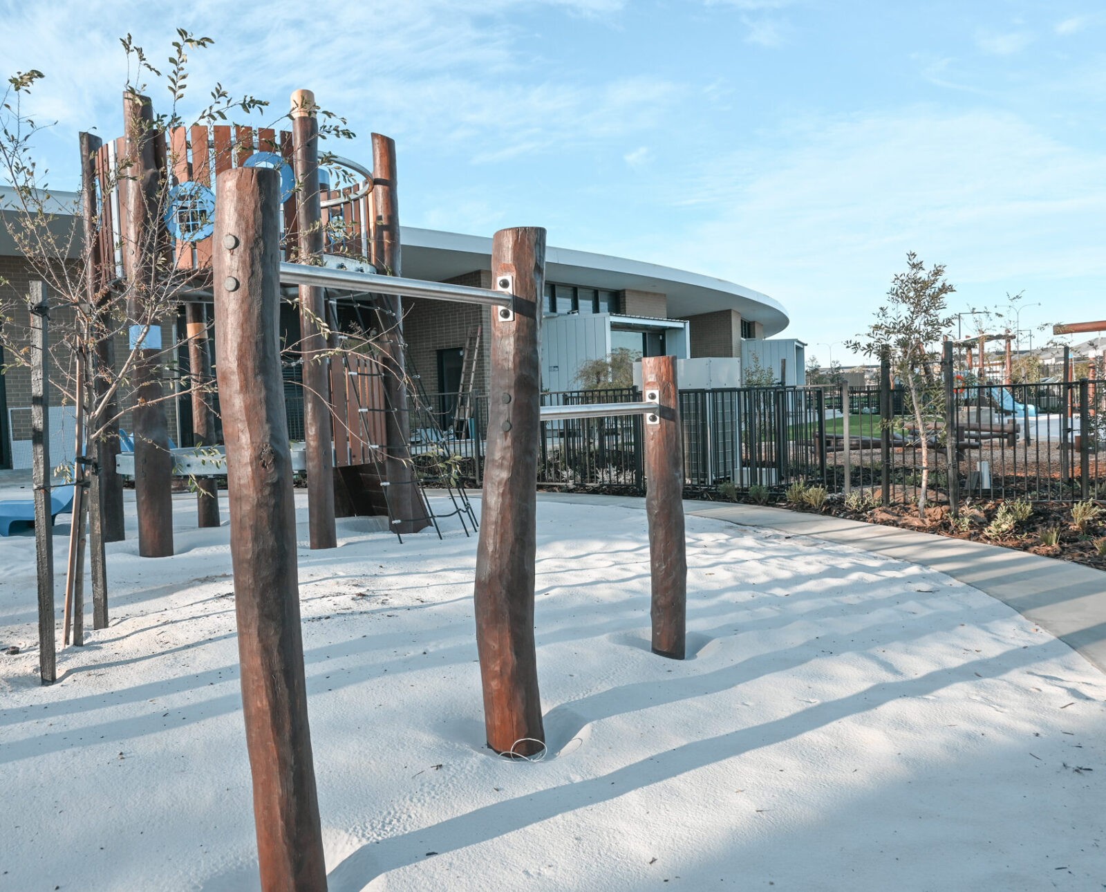 Challenge upper body strength with our Cross Bars, combining locally sourced West Australian Jarrah posts with stainless steel horizontal bars for dynamic overhead play.