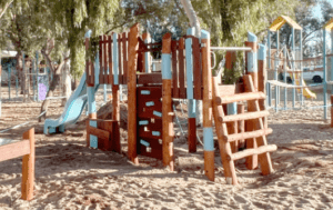 Van Ryt Industries Walkaway Cubby featuring split-level platforms, slide and climbing elements crafted from West Australian Jarrah hardwood