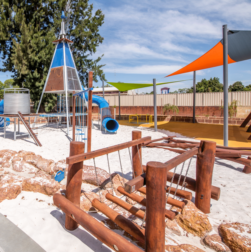 Floating Logs Walk | Challenge balance and coordination with our Floating Log Walk, featuring swaying timber logs for a dynamic playground pathways that will develop confidence and spatial awareness. | VRI