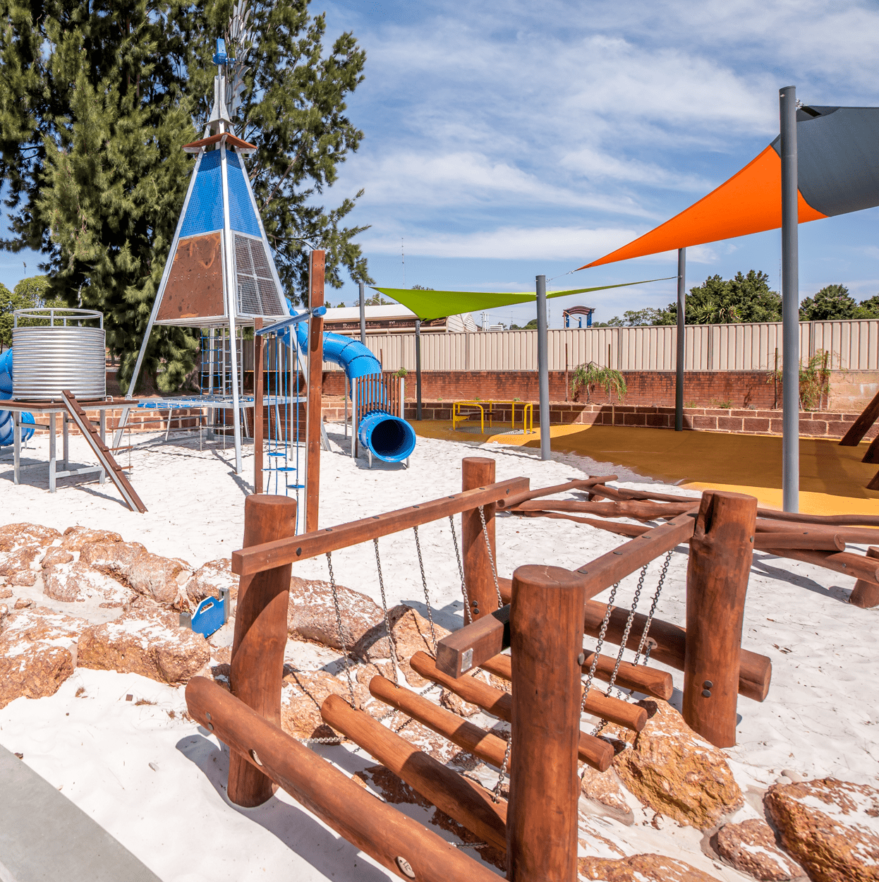 Floating Logs Walk | Challenge balance and coordination with our Floating Log Walk, featuring swaying timber logs for a dynamic playground pathways that will develop confidence and spatial awareness. | VRI
