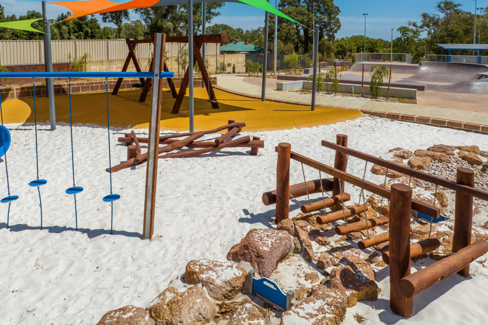 Floating Logs Walk | Challenge balance and coordination with our Floating Log Walk, featuring swaying timber logs for a dynamic playground pathways that will develop confidence and spatial awareness. | VRI