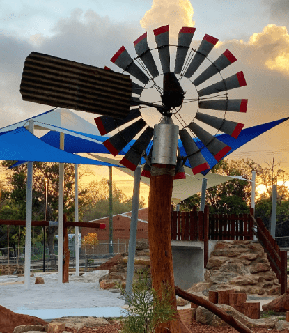 Windmill | Enhance rural play scenes with our authentic Windmill feature, combining natural timber construction with premium stainless steel mechanics for engaging farm-themed experiences. | VRI