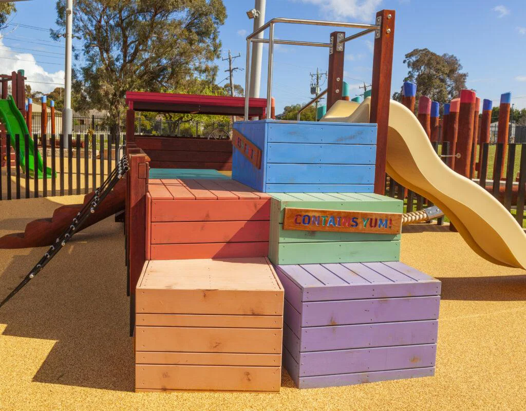 Loaded Fruit Truck | Experience feature-packed fun with the Loaded Fruit Truck, boasting colourful stacked crate climbers, nets, slide, log steps, and a unique under-tray tunnel. | VRI