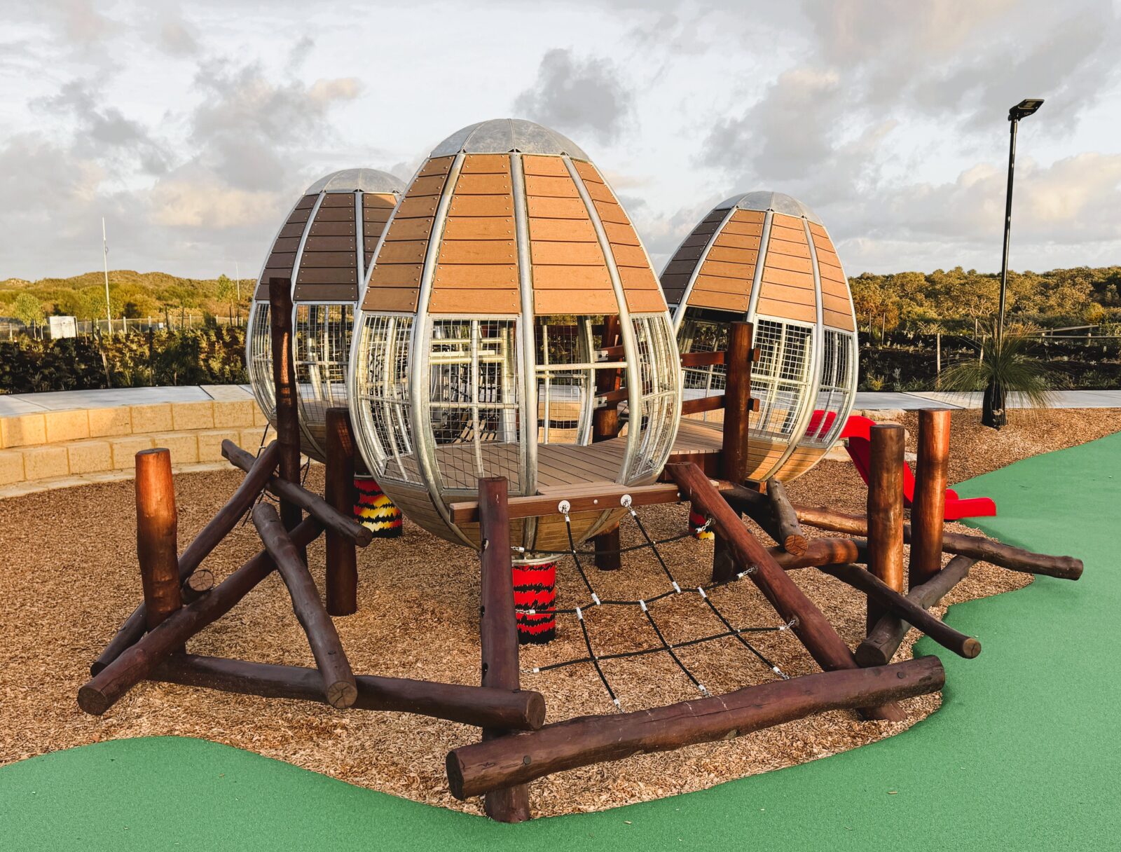 Giant Eggs | Captivate imaginations with the Giant Eggs playground structure, a unique WA-made focal point inspired by the iconic Red-tailed Black Cockatoo (