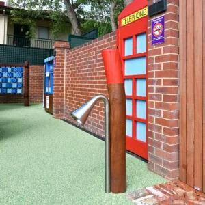 Talking Tubes on Bush Poles | A durable and interactive stainless steel talking tube mounted on Jarrah bush poles, designed to encourage social interaction and imaginative play among children. | VRI