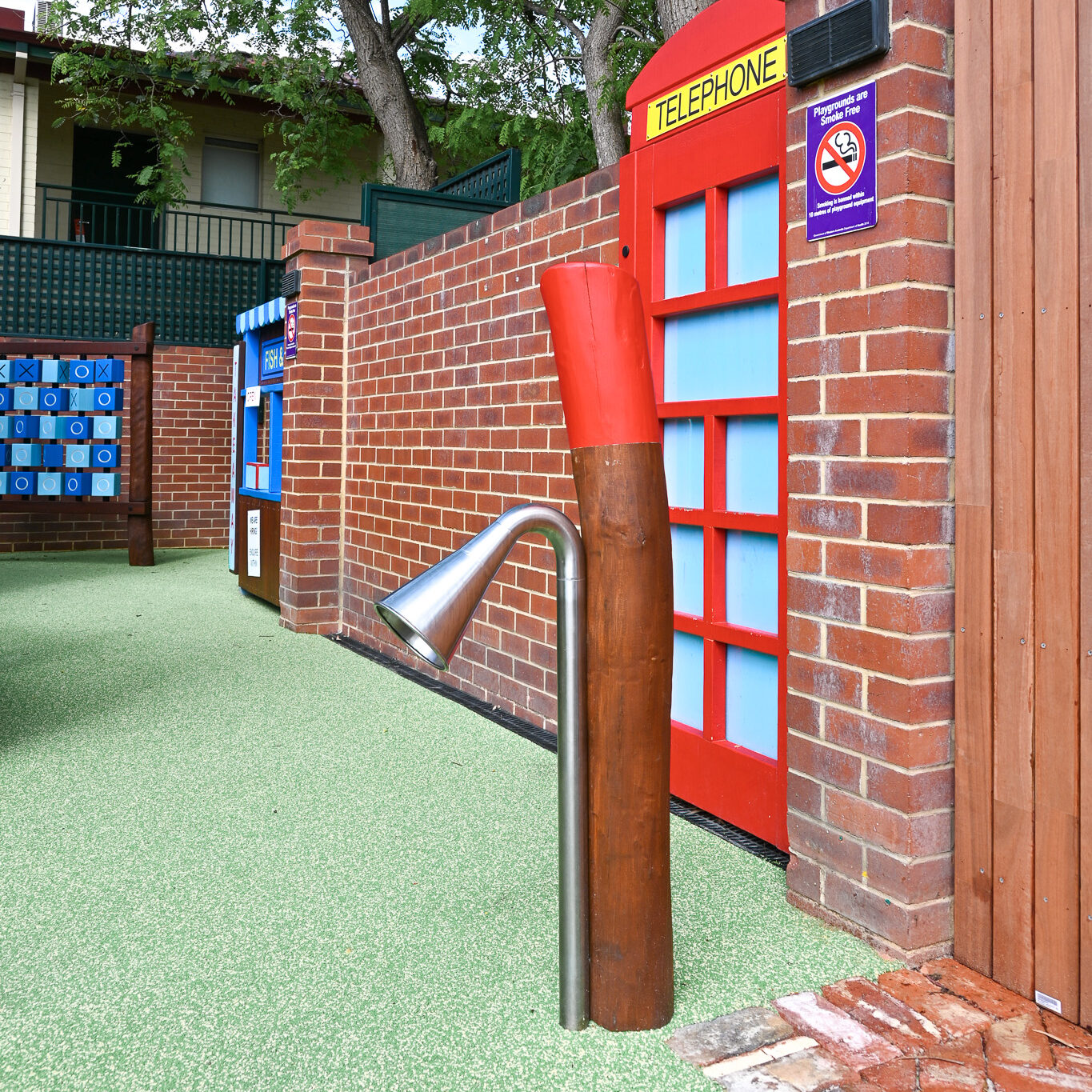 Talking Tubes on Bush Poles | A durable and interactive stainless steel talking tube mounted on Jarrah bush poles, designed to encourage social interaction and imaginative play among children. | VRI