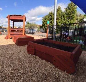 Train Carriage Planting Box | Extend locomotive fun with this versatile Train Carriage Planting Box, crafted from thick WA Jarrah with custom wheels, ideal as a garden bed or sandpit. | VRI