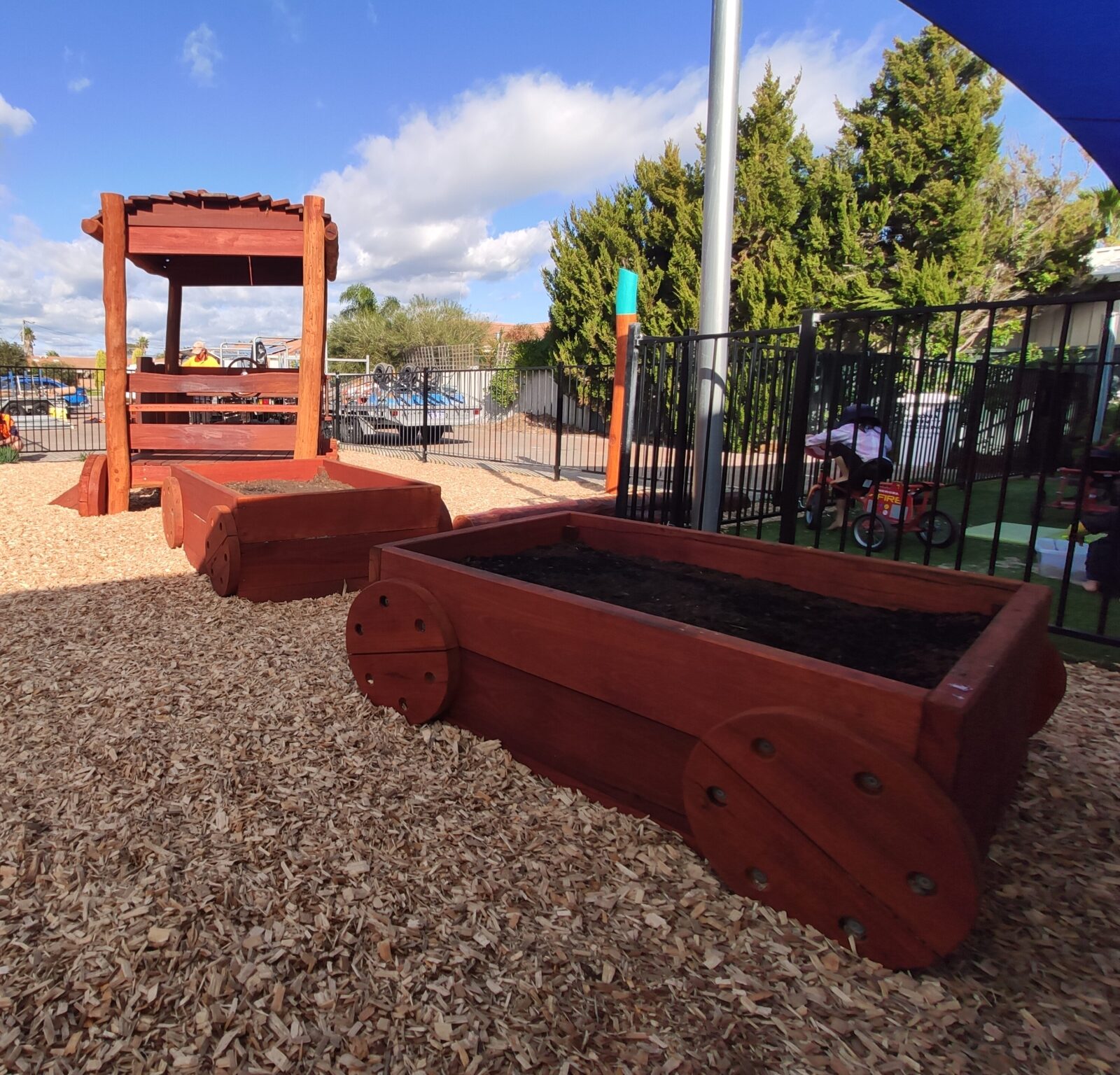 Train Carriage Planting Box | Extend locomotive fun with this versatile Train Carriage Planting Box, crafted from thick WA Jarrah with custom wheels, ideal as a garden bed or sandpit. | VRI