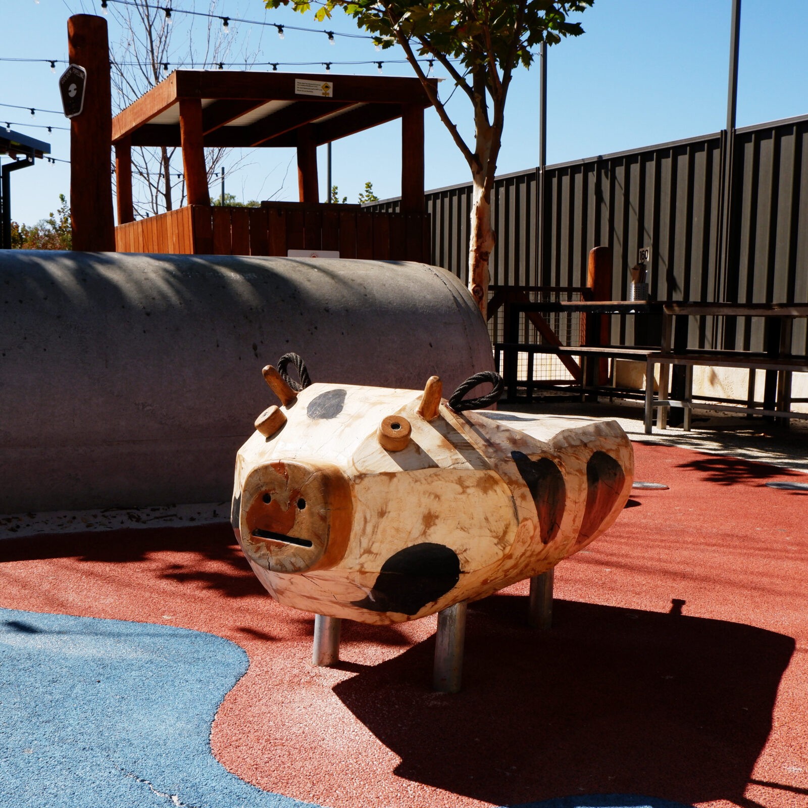 Mumma Pig Log | Enhance imaginative play with the Mumma Pig Log, hand-sculpted from local West Australian Jarrah for creative adventures. | VRI