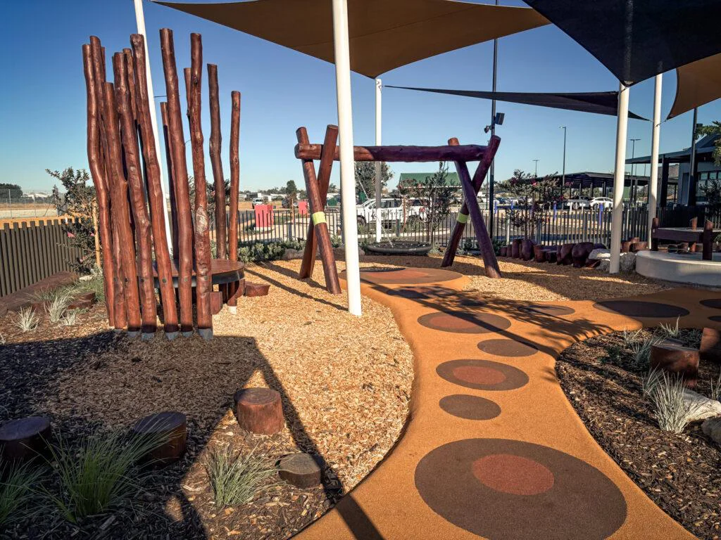 Fruit-themed timber playground at Vasse Village, Bunbury — designed and installed by Van Ryt Industries