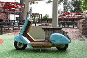 Moped | Spark imaginative journeys with this cute, retro-style Moped, a durable and eye-catching static play feature perfect for parks, ELCs, and commercial venues. | VRI