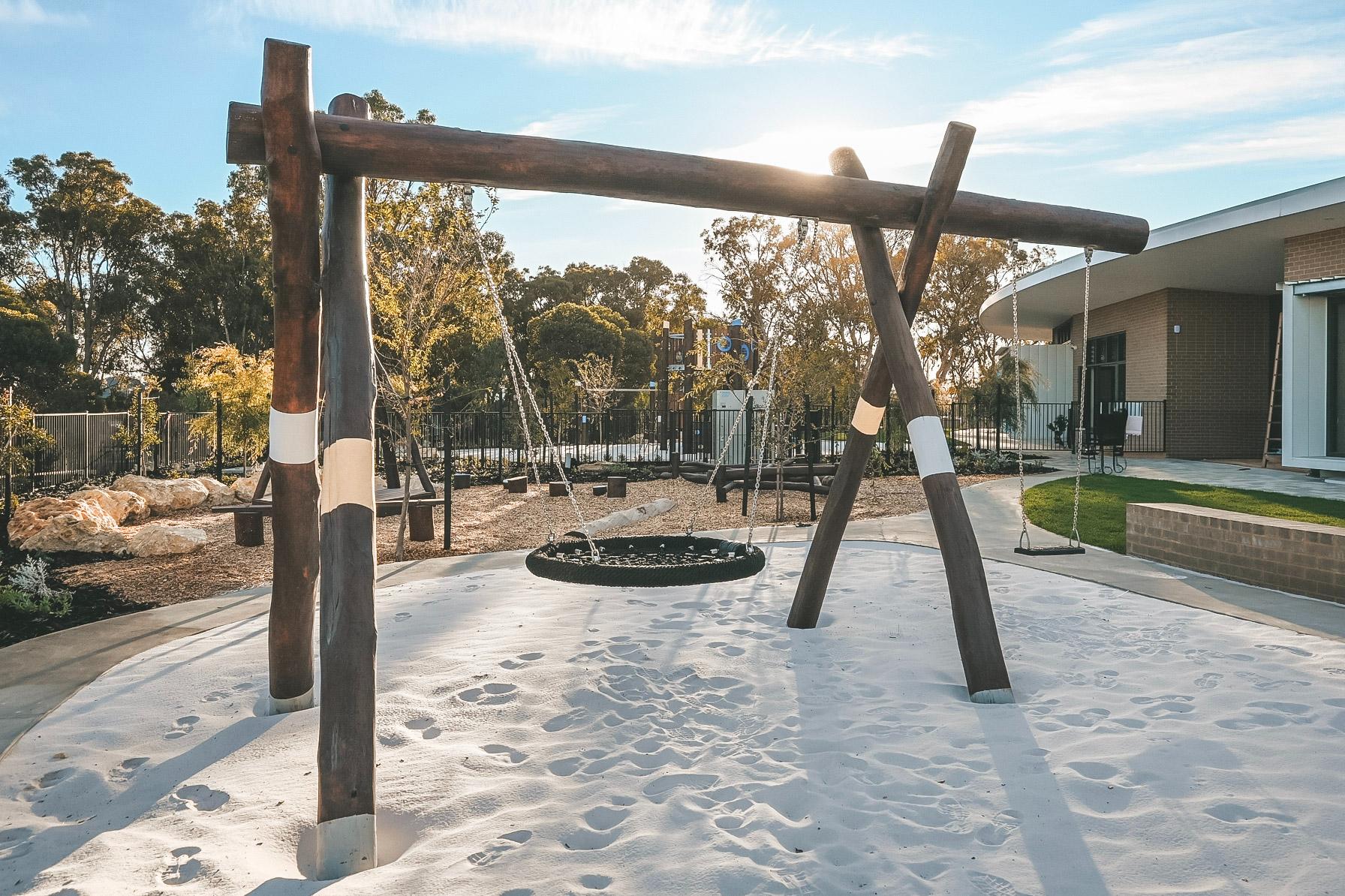 Van Ryt Industries Combination A-Frame Swing (203-ASS) in WA Jarrah hardwood, featuring both a basket seat and a single swing seat.