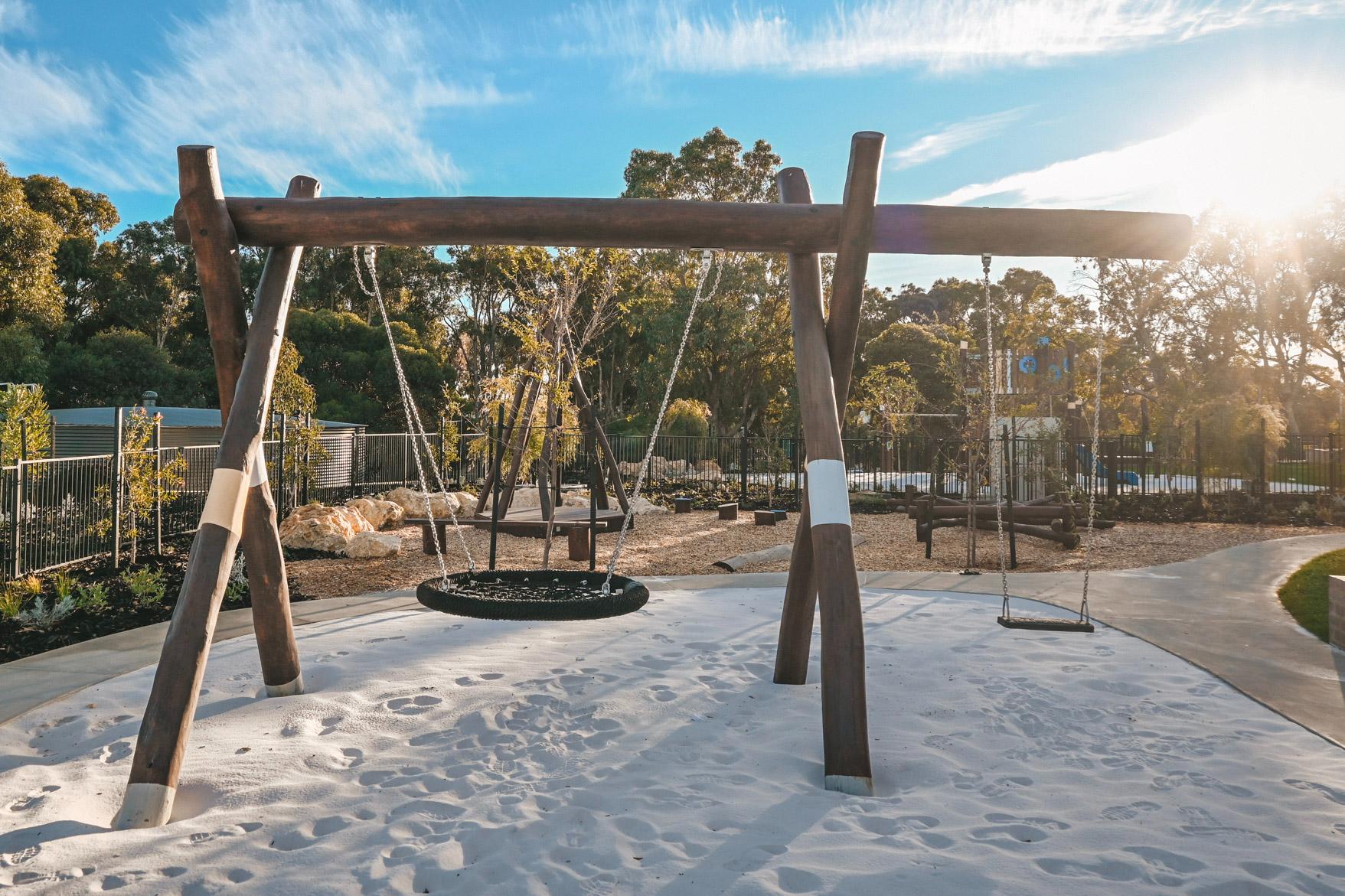 Van Ryt Industries Combination A-Frame Swing (203-ASS) in WA Jarrah hardwood, featuring both a basket seat and a single swing seat.