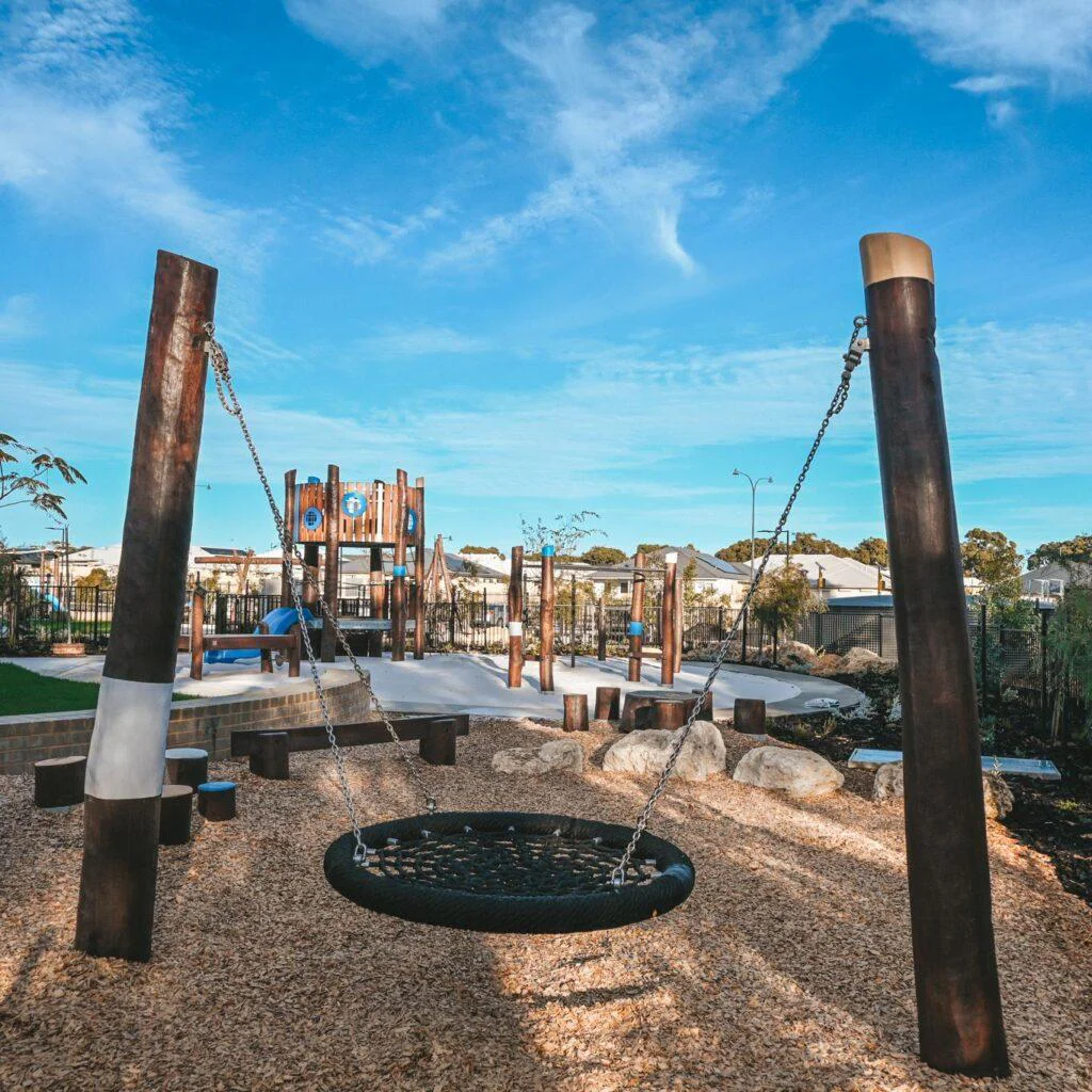 Double Pole Basket Swing | Offer robust, inclusive swinging with this Double Pole Basket Swing, featuring a sturdy Jarrah bush pole frame and a large basket seat ideal for high-use public spaces. | VRI