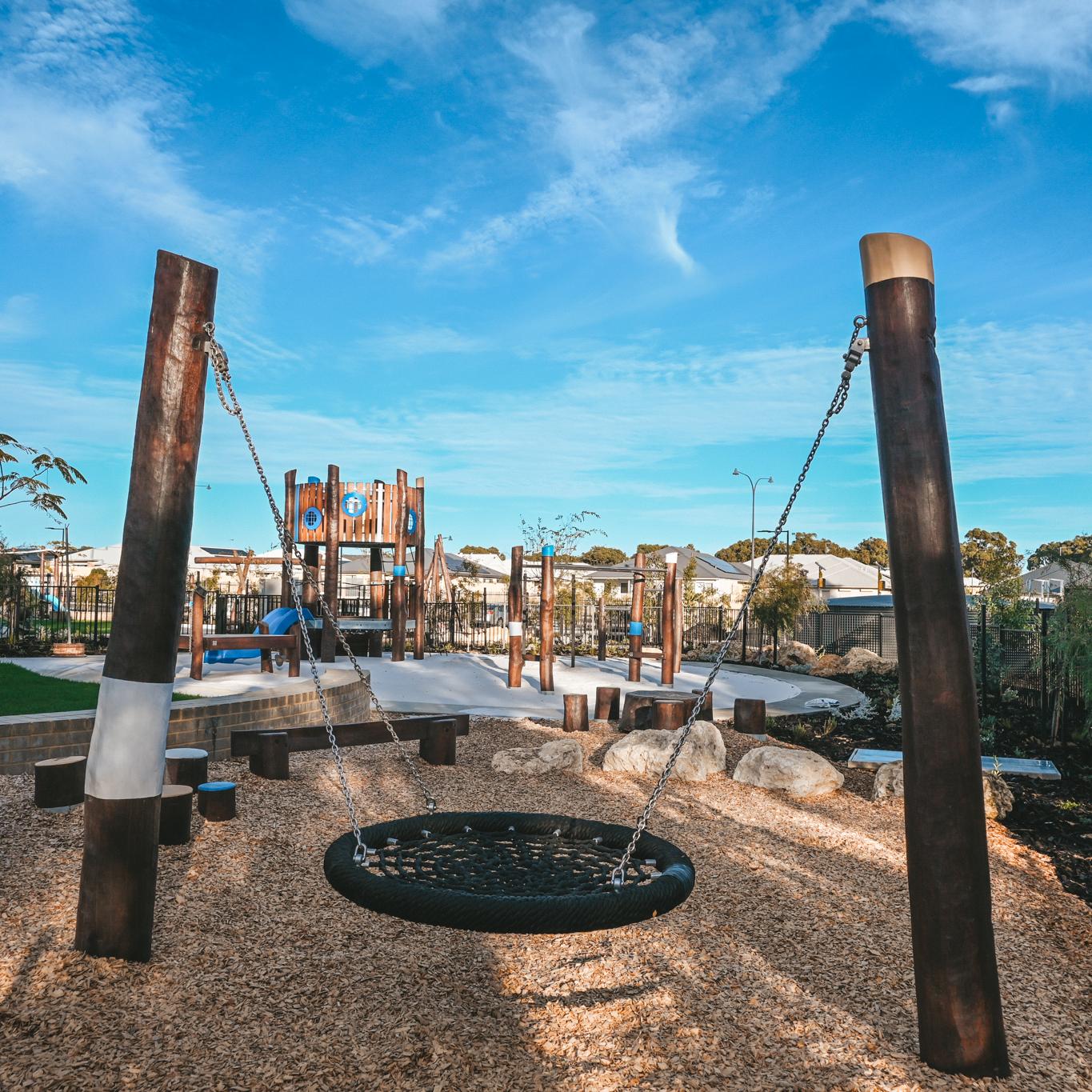 Double Pole Basket Swing | Offer robust, inclusive swinging with this Double Pole Basket Swing, featuring a sturdy Jarrah bush pole frame and a large basket seat ideal for high-use public spaces. | VRI