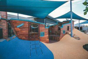 The large custom ship playground at the Inspira Kids custom early learning playspace WA, built by Van Ryt Industries.