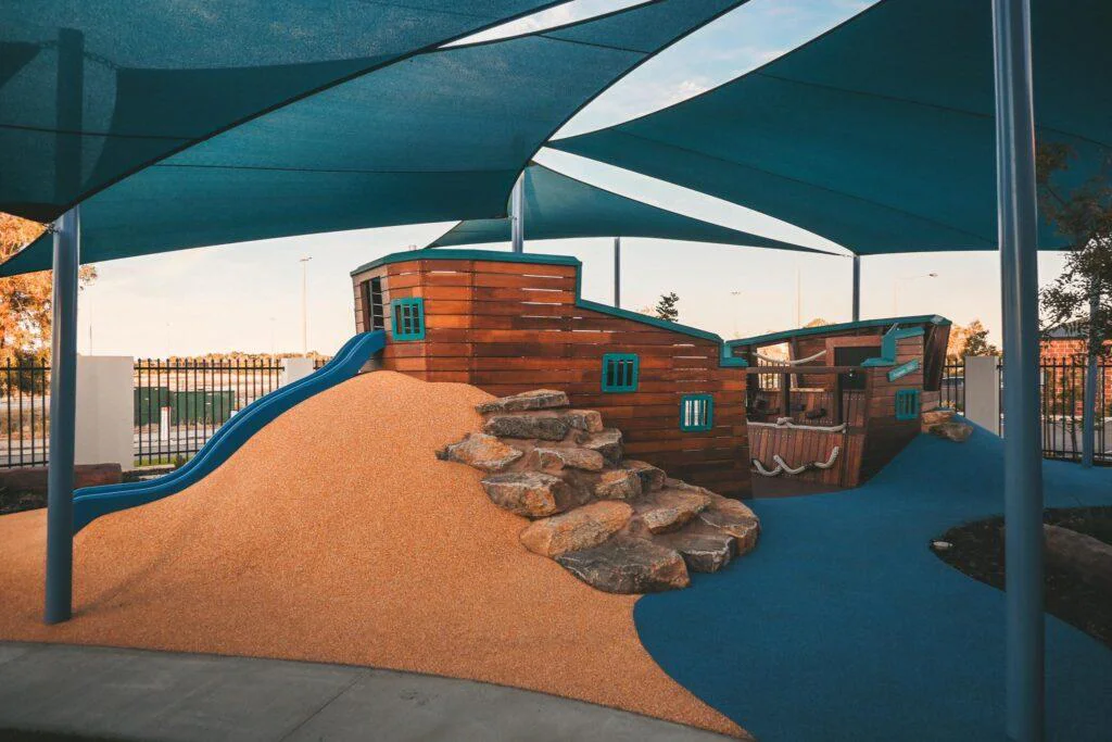 The large custom ship playground at the Inspira Kids custom early learning playspace WA, built by Van Ryt Industries.