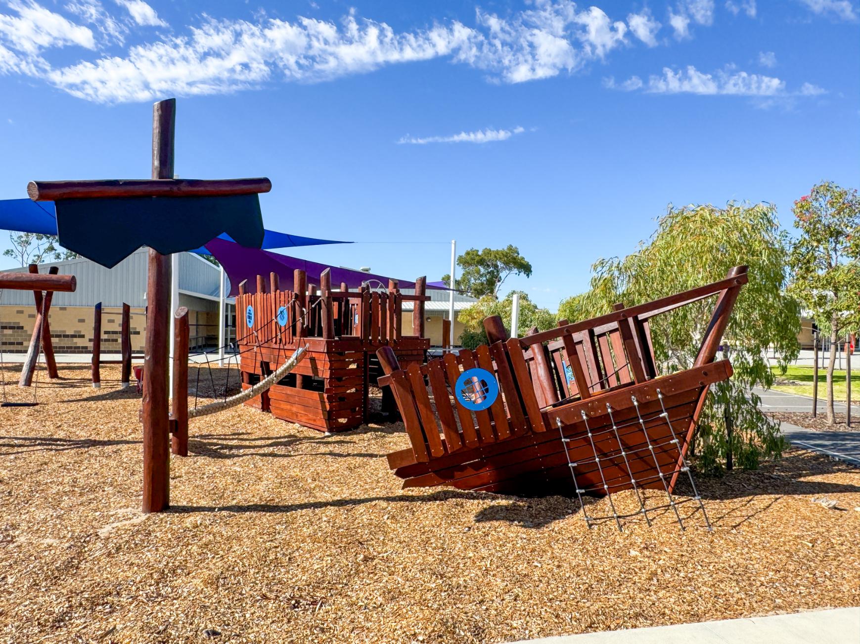 Custom timber Sunken Ship playground structure at Dayton Primary School, designed by VRI for Stage 2.
