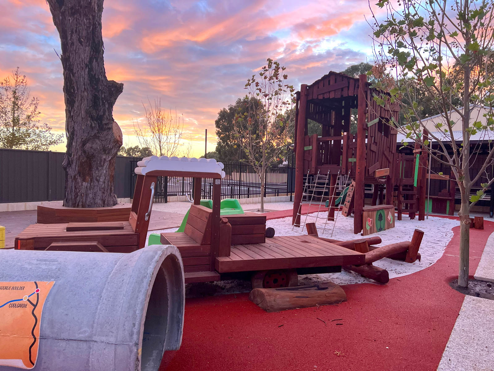 Golden Pipeline concrete tunnel with heritage trail map artwork at Charlie's Paddock playground Piara Waters