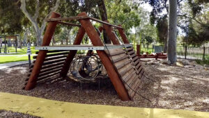 Custom steel and timber spider tunnel and circular climbing structure at Maylands Waterland splash pad Perth