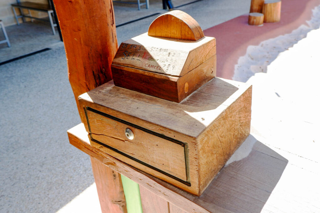 Bespoke Jarrah timber cash register with drawer and number keys on the Market Shop Front at Charlie's Paddock