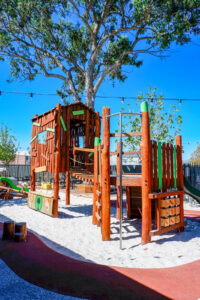 Custom treehouse cubby wide angle showing fireman's pole