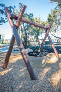 Crossed Jarrah timber logs arranged as climbing play elements at Baldivis Parks Stage 17 playground