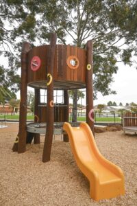 Mini Maniana Fort with orange slide at Maniana Park Queens Park by Van Ryt Industries