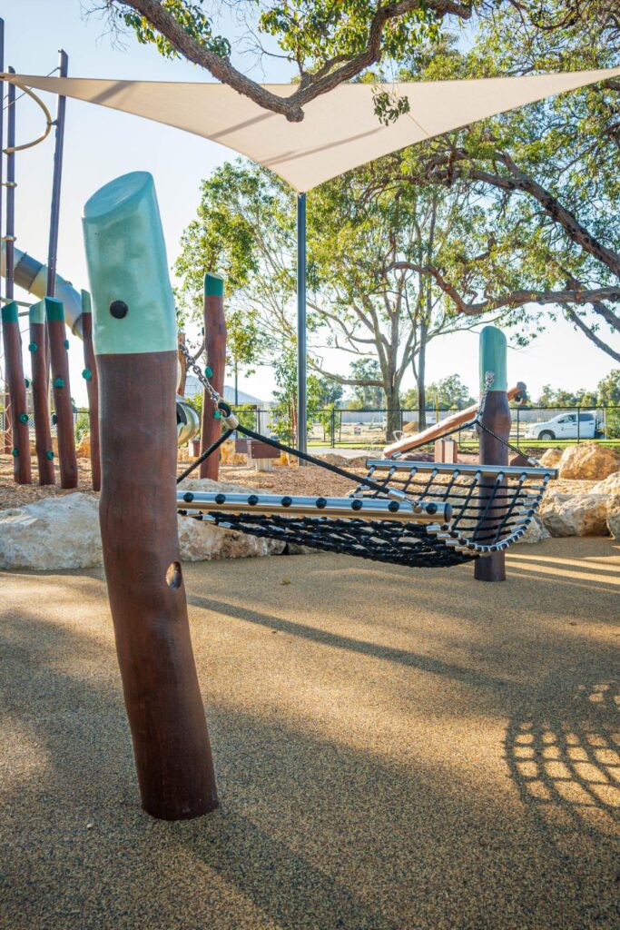 Swinging hammock with angled timber pole and rope net at Baldivis Parks Stage 17 playground