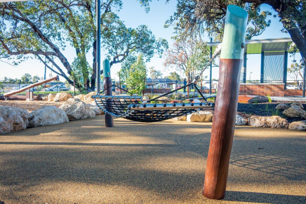 Close-up of swinging hammock with angled Jarrah bushpole support at Baldivis Parks Stage 17 playground